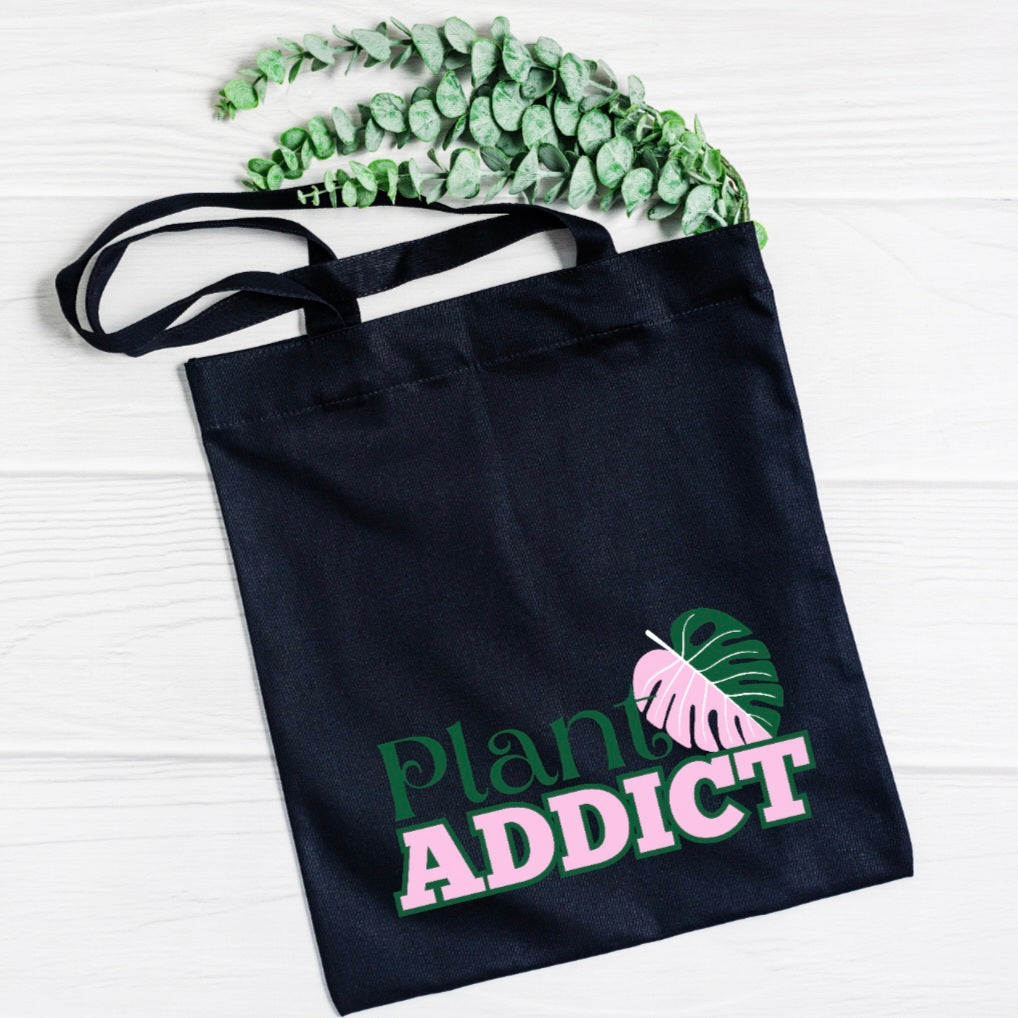 Plant Addict Pink Monstera Leaf Black Cotton Tote Bag