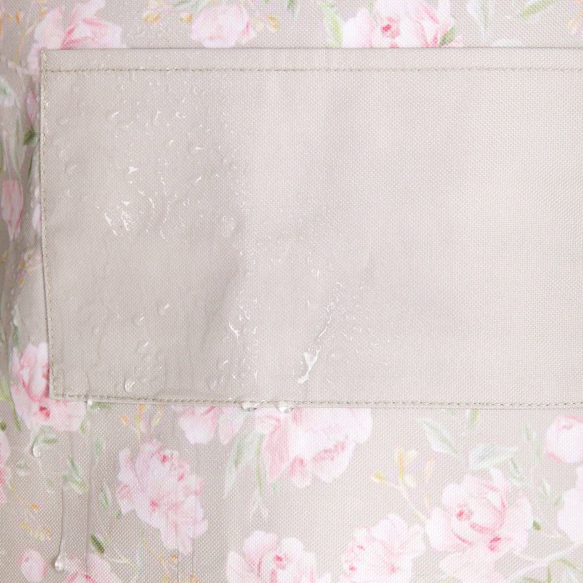 Floral patterned fabric with pink flowers on a light background